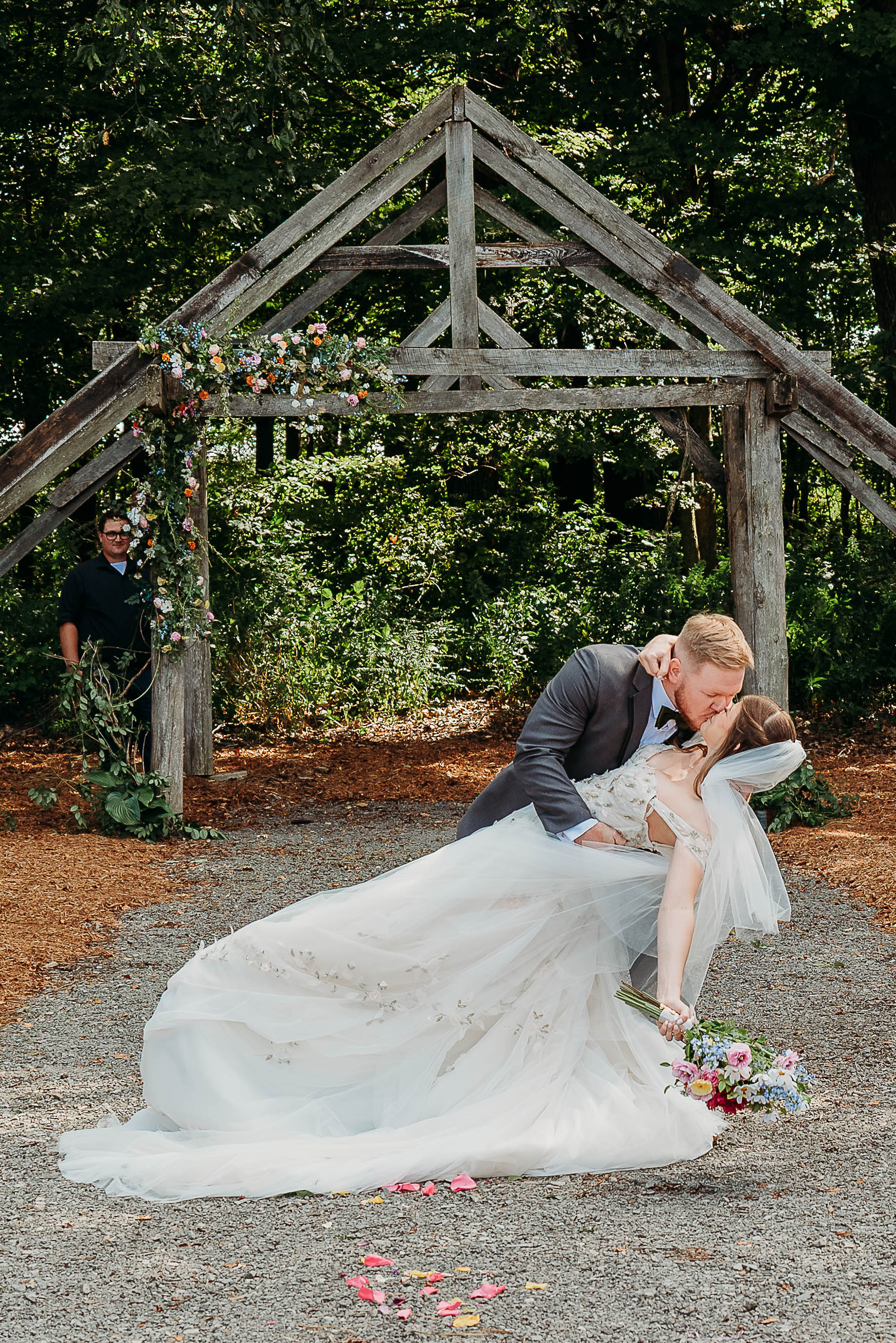 The couple's first kiss at the close of the ceremony.